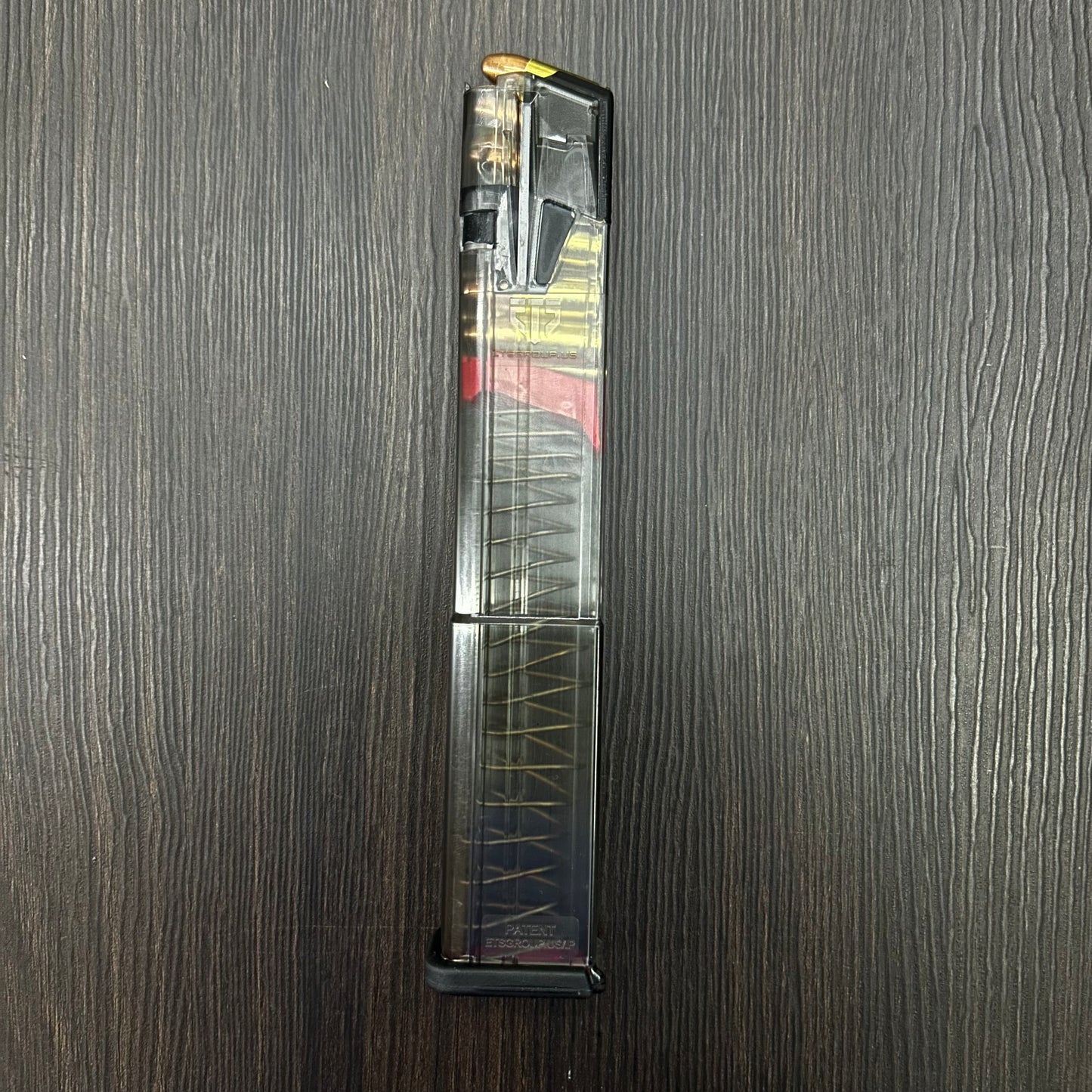 CARGADOR TRANSPARENTE EXPANSIVO PARA PISTOLAS GLOCK 17, 19, 19X, 26, 34 Y 45 DE 32 BALAS, CALIBRE 9MM