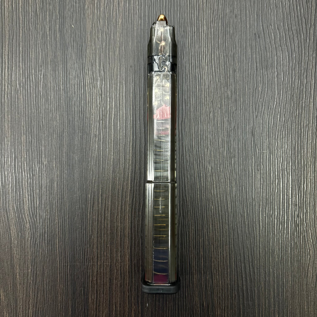 CARGADOR TRANSPARENTE EXPANSIVO PARA PISTOLAS GLOCK 17, 19, 19X, 26, 34 Y 45 DE 32 BALAS, CALIBRE 9MM