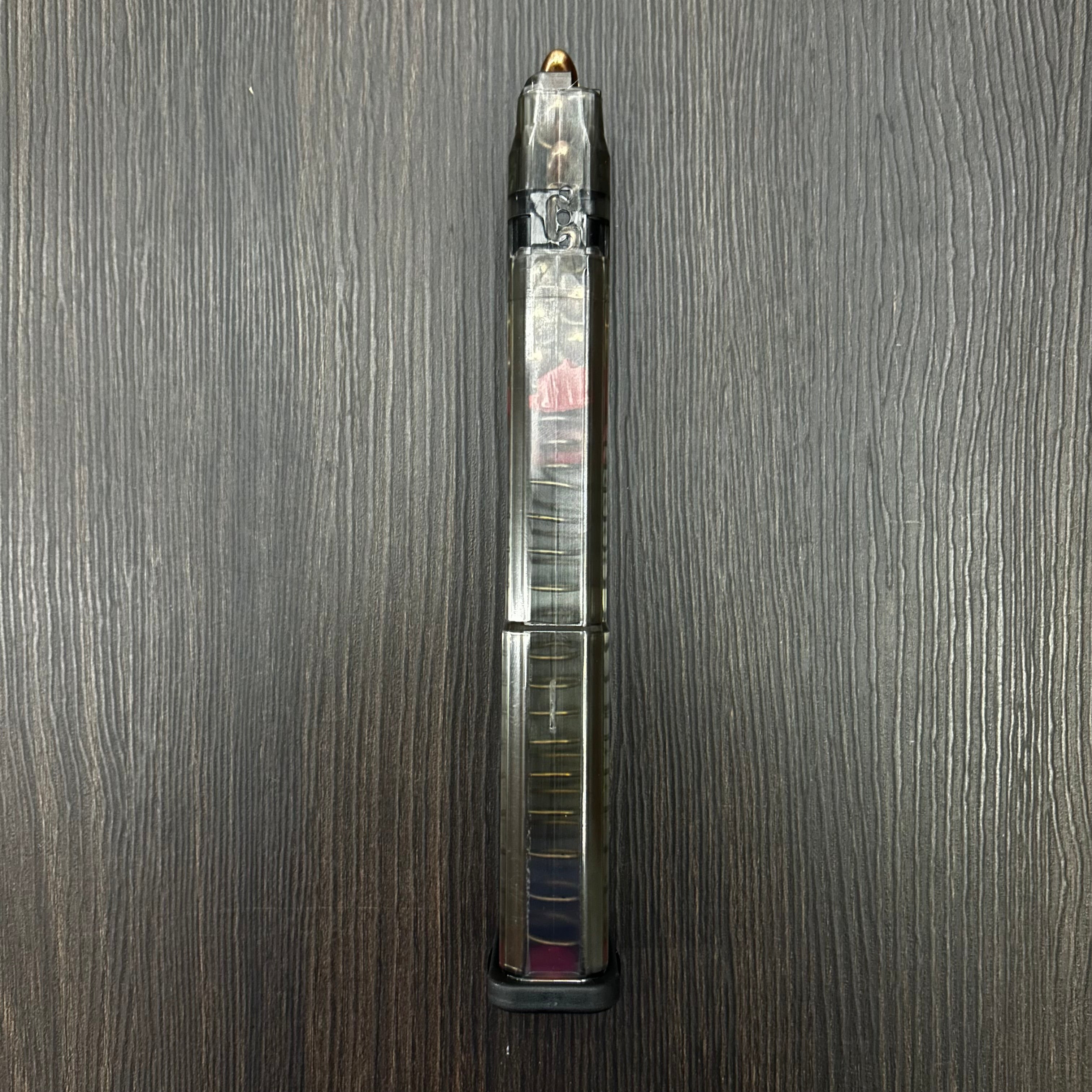 CARGADOR TRANSPARENTE EXPANSIVO PARA PISTOLAS GLOCK 17, 19, 19X, 26, 34 Y 45 DE 32 BALAS, CALIBRE 9MM